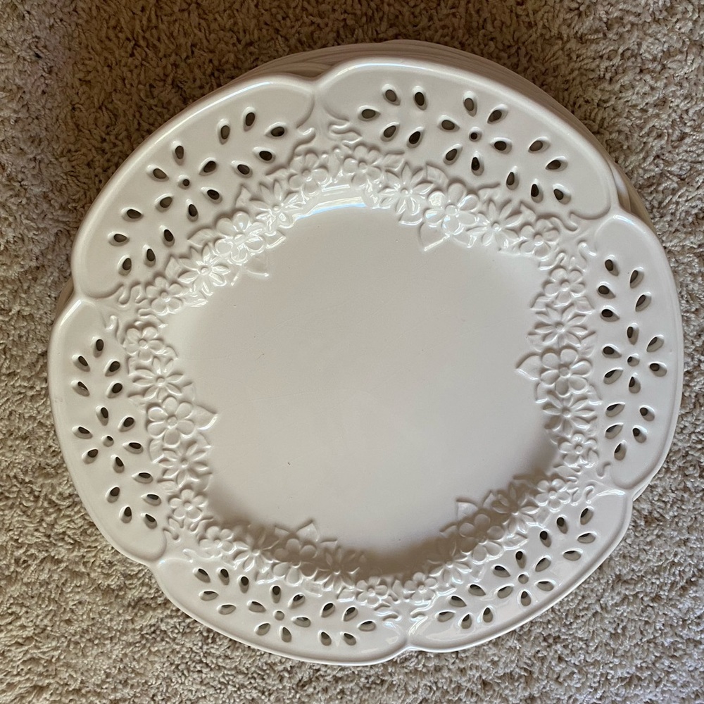 Antique white floral plates made in Portugal.